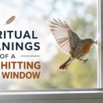 spiritual meanings of a bird hitting your window